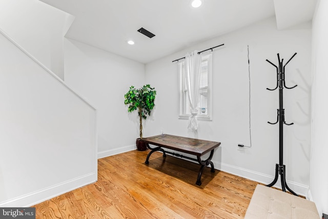 miscellaneous room featuring hardwood / wood-style floors