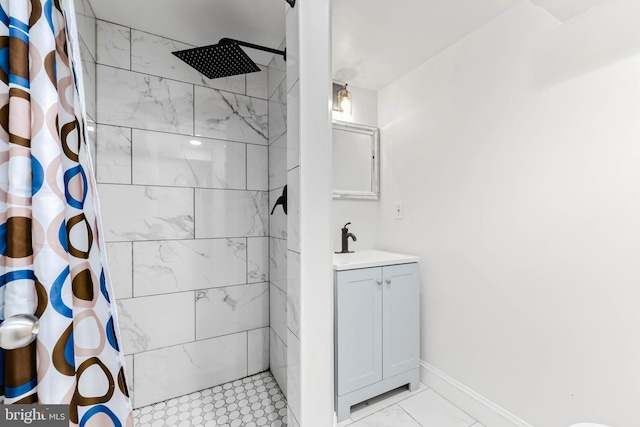 4201 Morrison Ct, Baltimore City, MD 21226 - bathroom featuring tiled shower, vanity, marble finish floor, and baseboards
