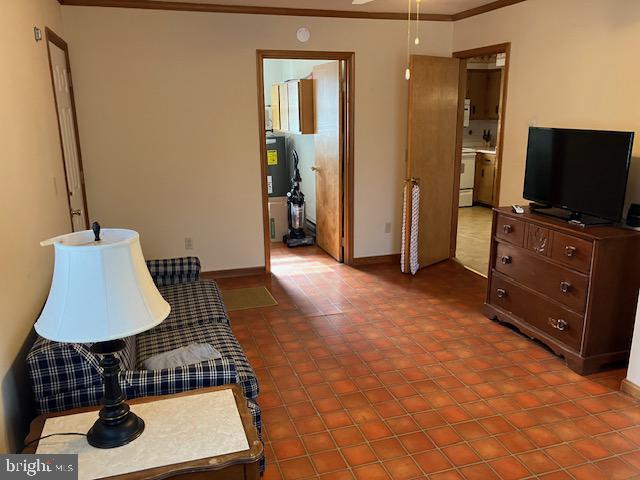 living room with crown molding