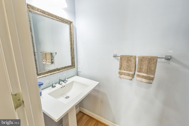 bathroom featuring hardwood / wood-style flooring