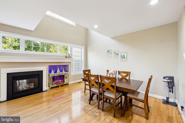 dining area featuring light wood-type flooring