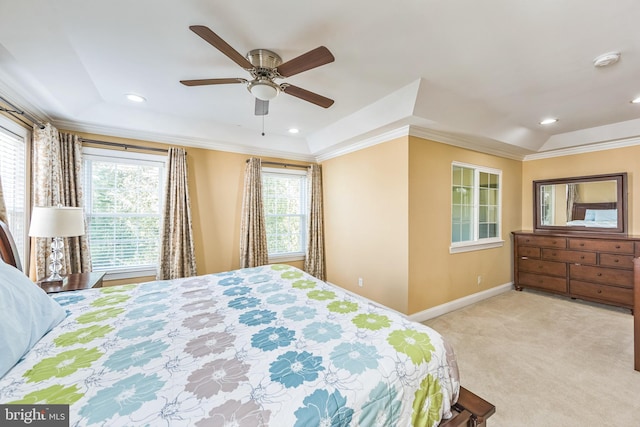 carpeted bedroom featuring ornamental molding and ceiling fan