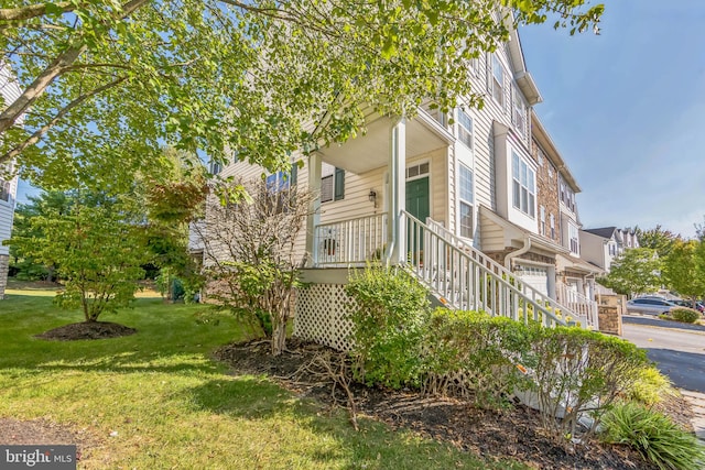 exterior space with a front lawn