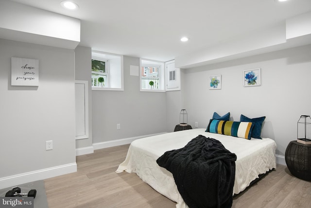 bedroom featuring light hardwood / wood-style floors