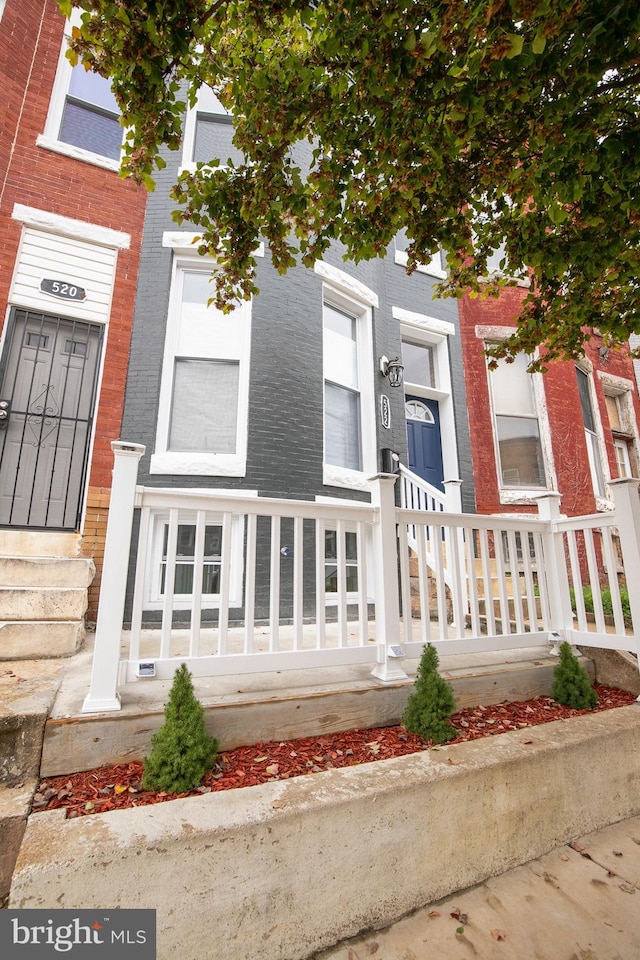 doorway to property featuring a porch