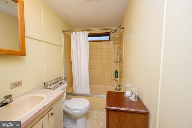 full bathroom with vanity, toilet, a textured ceiling, and shower / bath combo