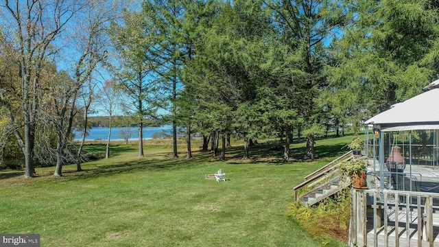 view of yard with a water view