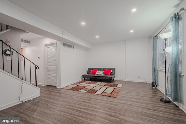 living area with wood-type flooring