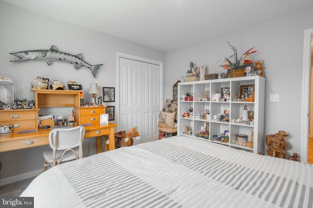 carpeted bedroom featuring a closet