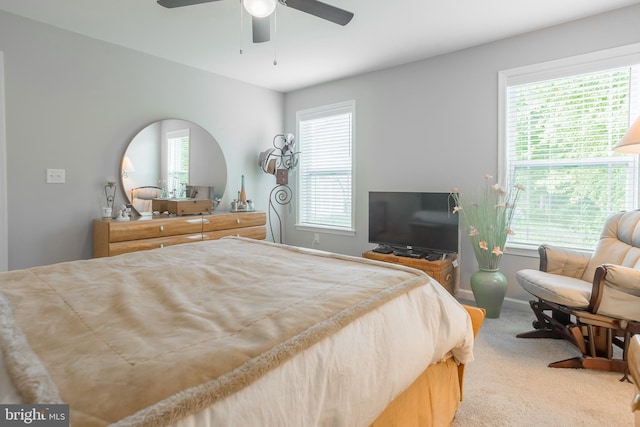 bedroom featuring ceiling fan and carpet flooring