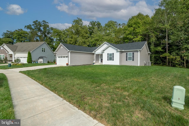 ranch-style home featuring a garage, a front lawn, and central air condition unit