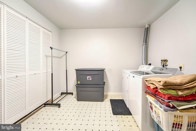 laundry room featuring washing machine and dryer