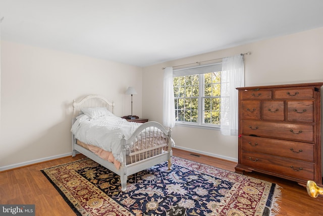 bedroom featuring hardwood / wood-style floors