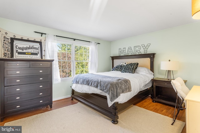 bedroom featuring hardwood / wood-style floors