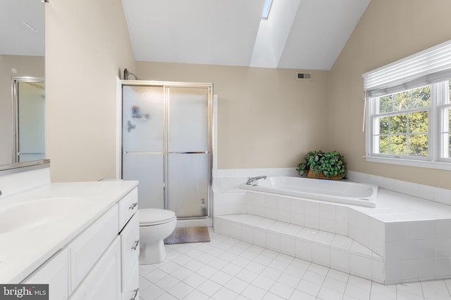 full bathroom with vanity, lofted ceiling, tile patterned floors, shower with separate bathtub, and toilet