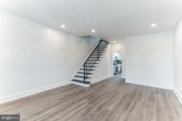 unfurnished living room featuring light hardwood / wood-style flooring