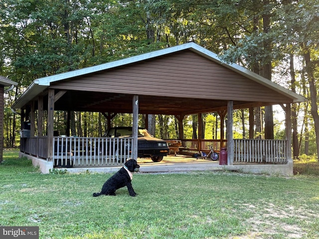 view of property's community featuring a wooden deck and a yard