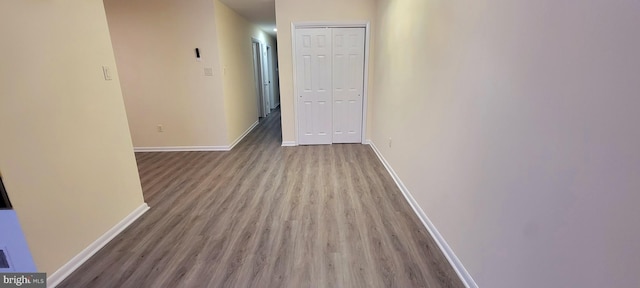 hall with light wood-type flooring