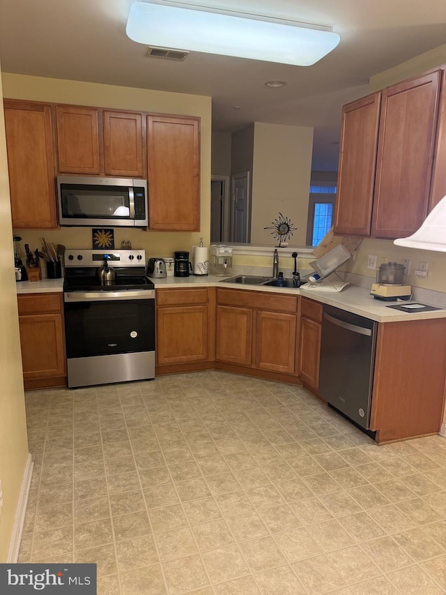 kitchen featuring sink and stainless steel appliances