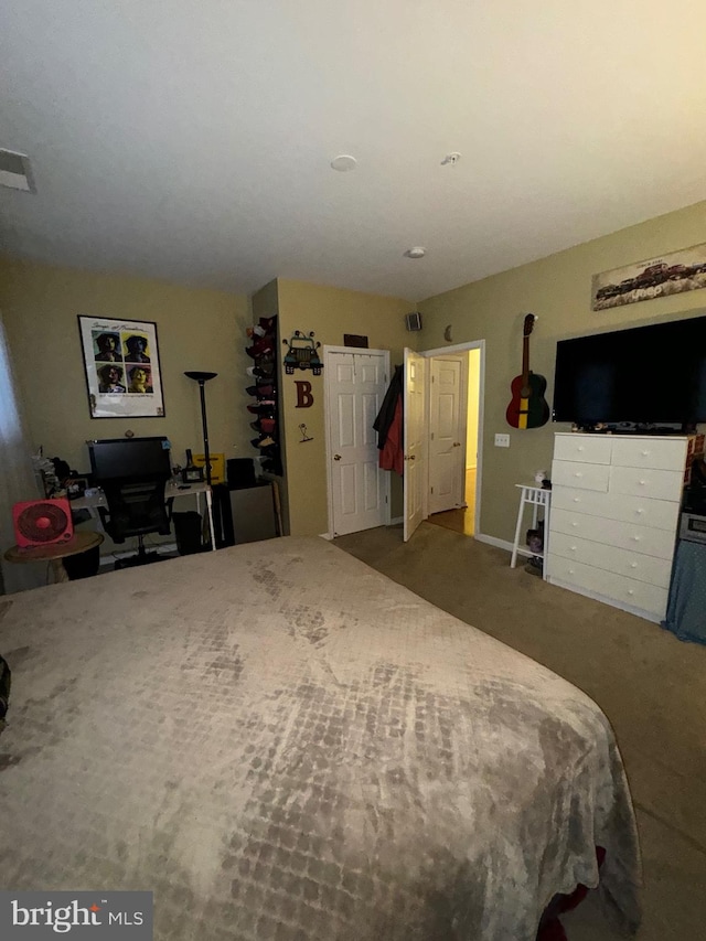 bedroom featuring carpet