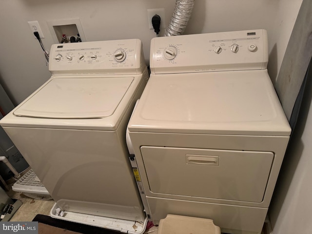 laundry area featuring washing machine and dryer