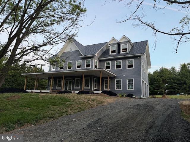 view of front of home featuring covered porch