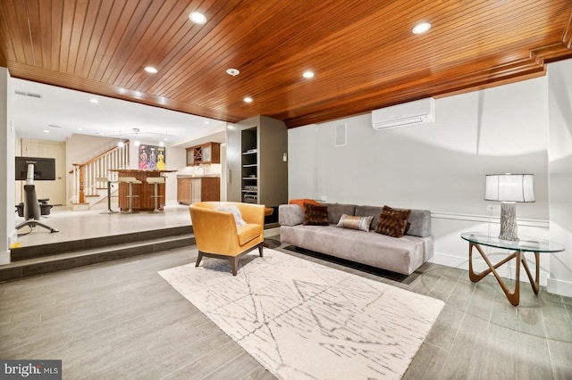 living room featuring wooden ceiling, light wood-type flooring, indoor bar, built in shelves, and a wall mounted air conditioner