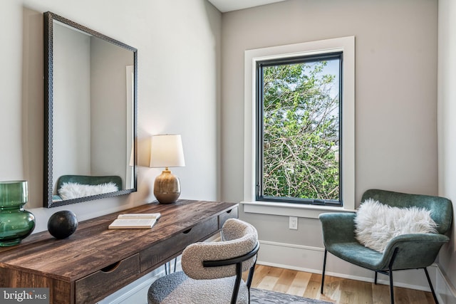 office area with hardwood / wood-style floors