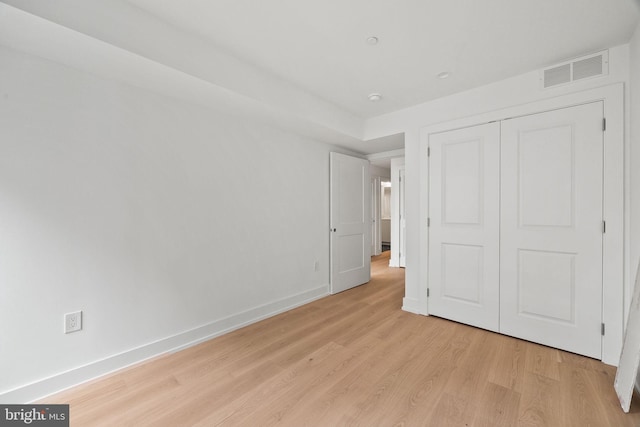 706 Latona St Unit J, Philadelphia, PA 19147 - unfurnished bedroom with light wood-type flooring, baseboards, and a closet