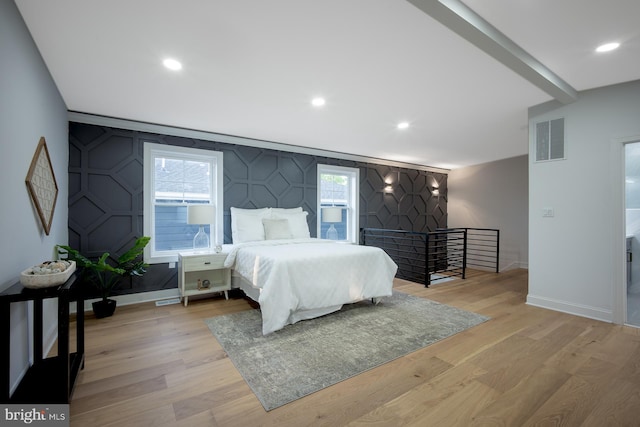 bedroom with light hardwood / wood-style floors