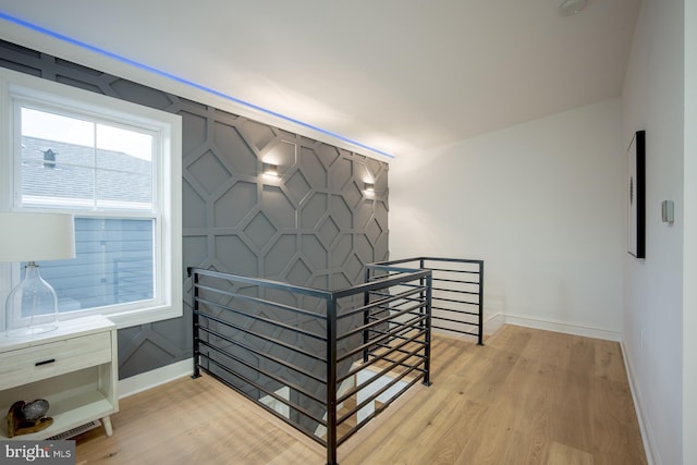 hallway featuring light hardwood / wood-style flooring