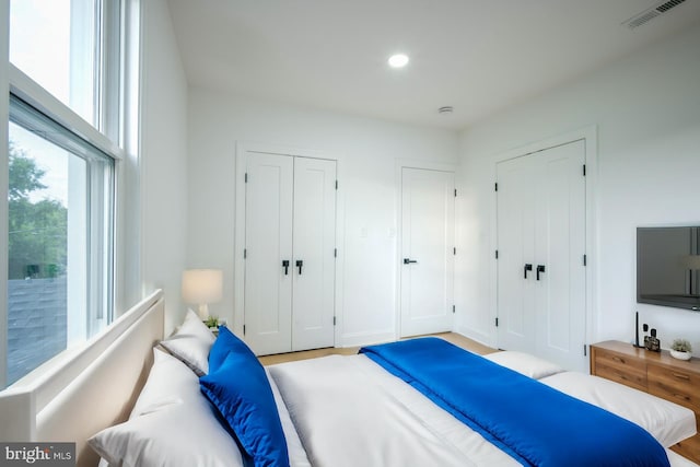 bedroom featuring light wood-type flooring