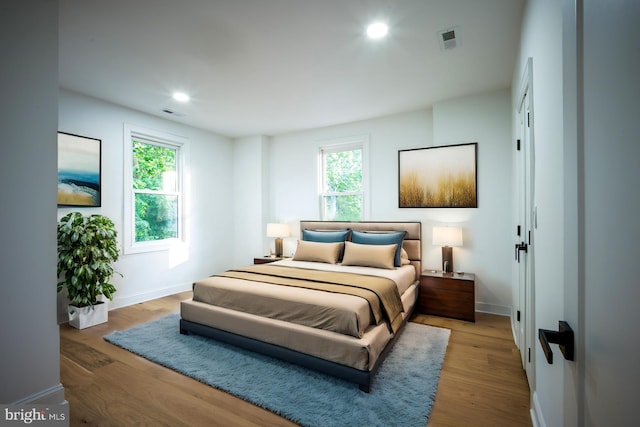 bedroom featuring wood-type flooring