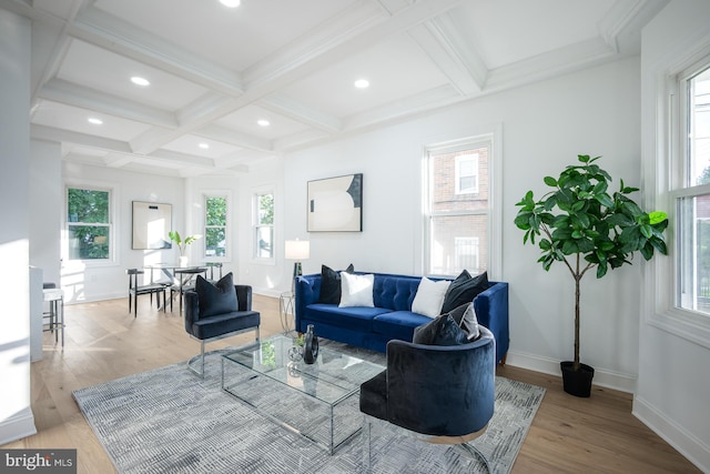 living room featuring coffered ceiling, beamed ceiling, and light hardwood / wood-style flooring