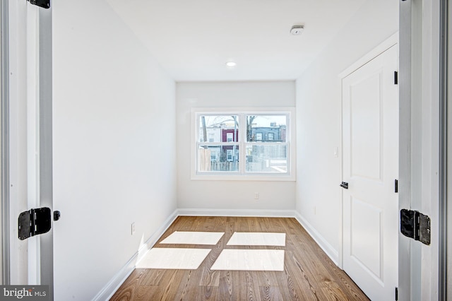 spare room with light wood-type flooring