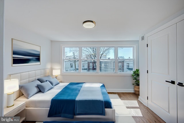 bedroom featuring hardwood / wood-style floors