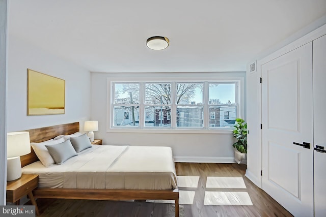 bedroom featuring hardwood / wood-style floors