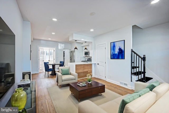 living room featuring light hardwood / wood-style flooring