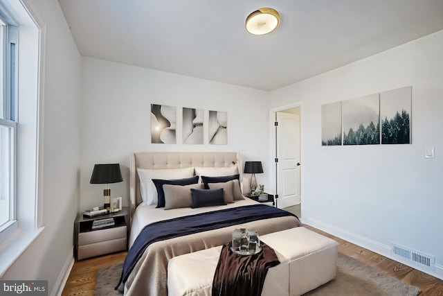 bedroom featuring hardwood / wood-style flooring