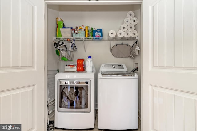 laundry area featuring separate washer and dryer