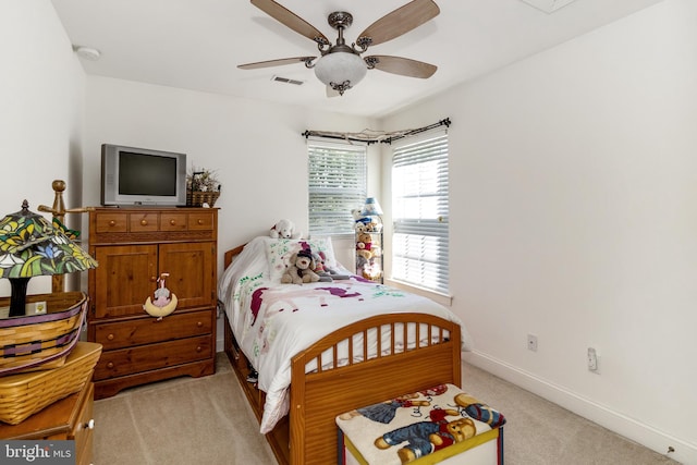 carpeted bedroom with ceiling fan