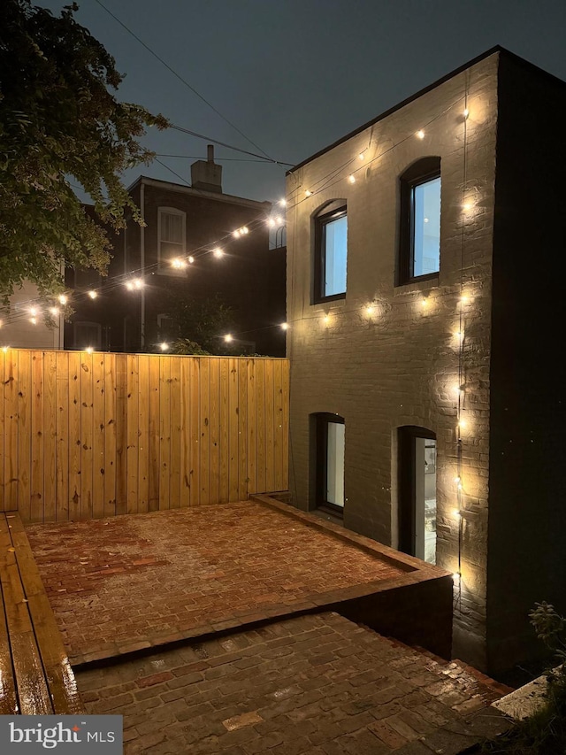 view of patio at twilight