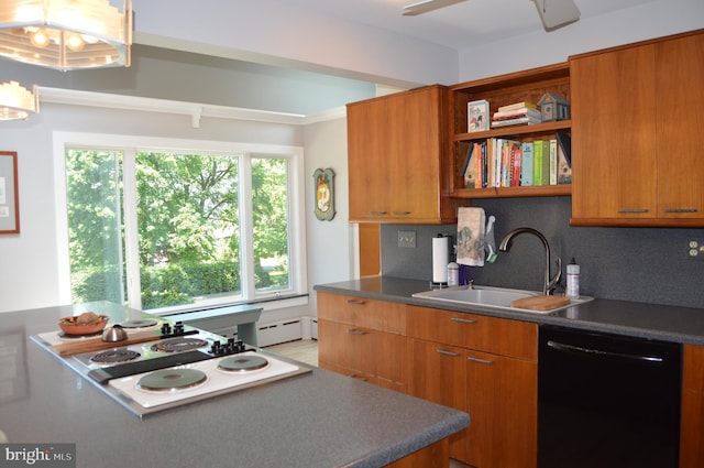 kitchen with sink, dishwasher, plenty of natural light, and backsplash