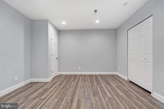 unfurnished bedroom with light hardwood / wood-style flooring