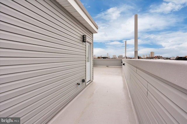 view of property exterior with a balcony