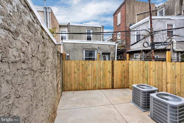 view of patio with central air condition unit