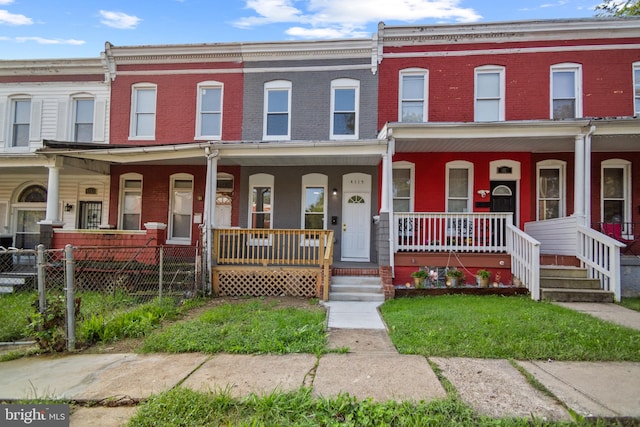 multi unit property featuring covered porch