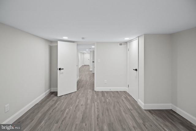 basement with dark wood-type flooring