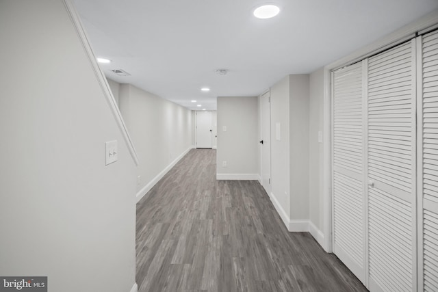 hall with dark hardwood / wood-style floors