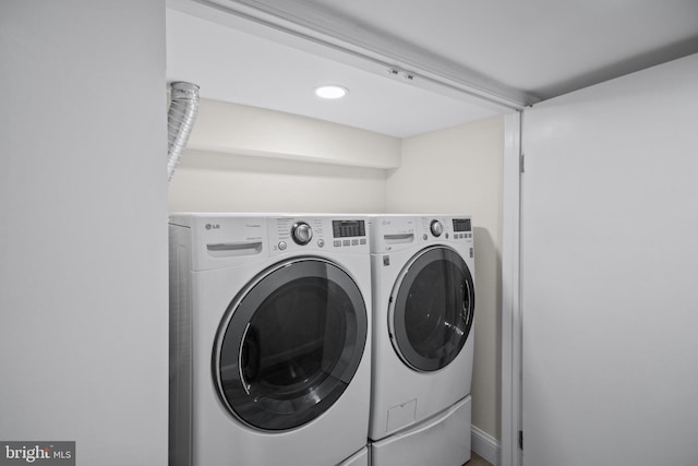 washroom featuring separate washer and dryer